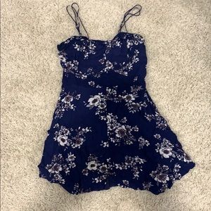 A darkish blue white flowered dress